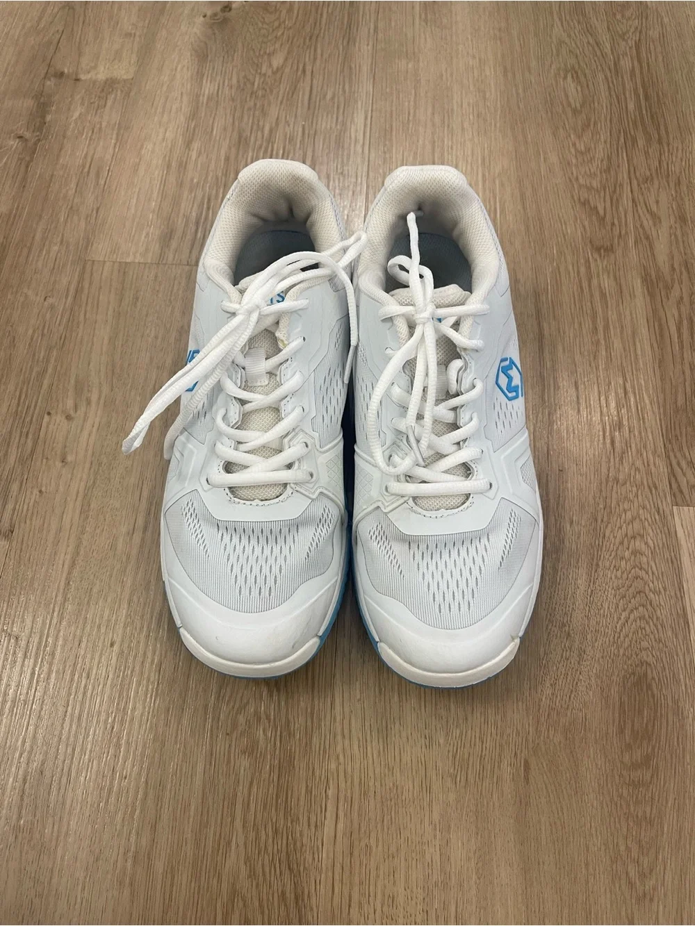 White Athletic Sneakers with Light Blue Accents